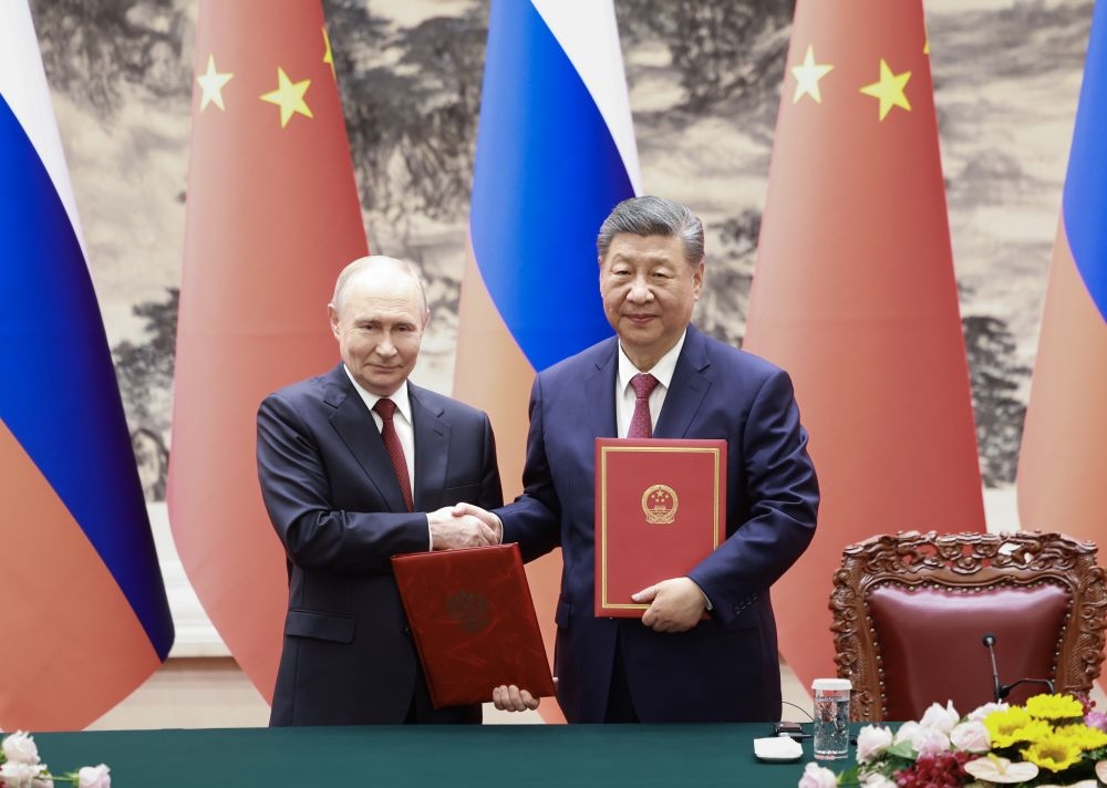 两国元首签署并发表《中华人民共和国和俄罗斯联邦关于进一步加强全面战略协作、深化睦邻友好合作的联合声明》1.jpg